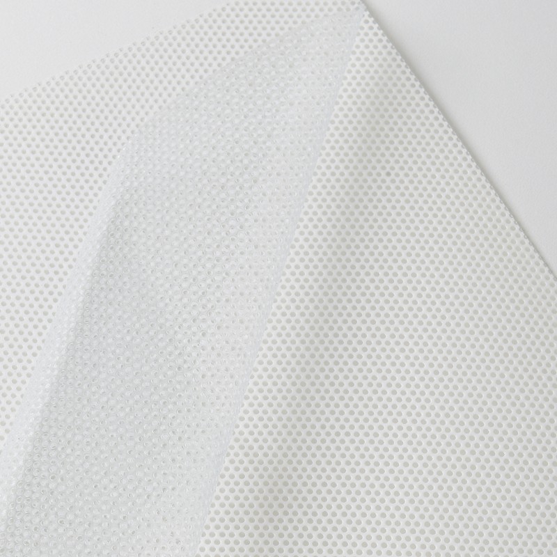 MICROCGUV - Microperforé Transparent Brillant adh enlevable incolore